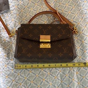 Pochette Mettis Brown satchel bag